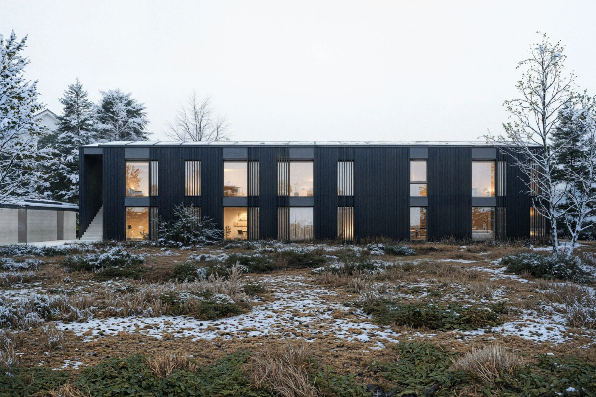Modernes Haus mit winterlicher Landschaft